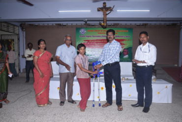Differently Abled student is being blessed with orthopedic appliance by the Correspondent